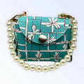 Sniffany & Co. |  Pearl Handle Pick Up Bag